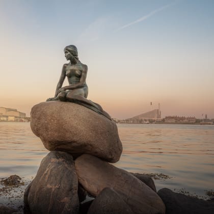Little mermaid statue at sunset - Copenhagen, Denmark