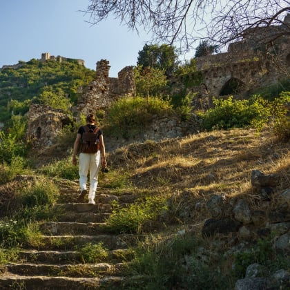 Man exploring Mystras town.