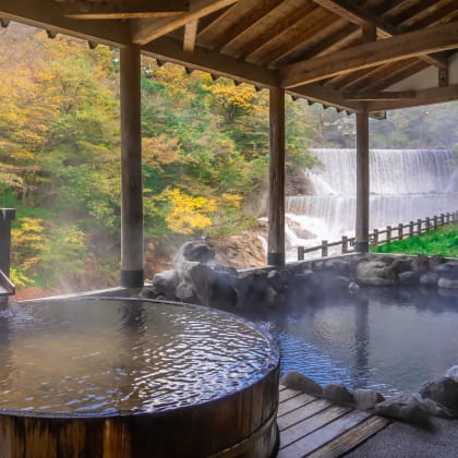 Japanese Hot Springs Onsen Natural Bath Surrounded by red-yellow